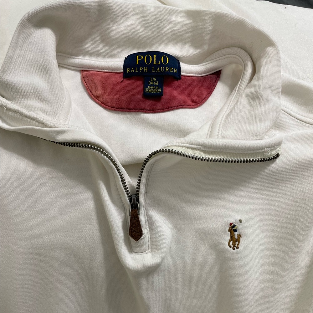 Boys large. White long sleeve zippered collar.